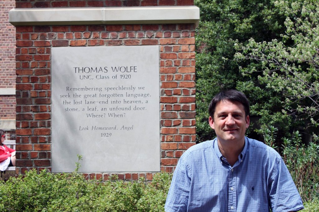 UNC historian Fitz Brundage in front of the Thomas Wolfe Memorial on UNC’s campus,