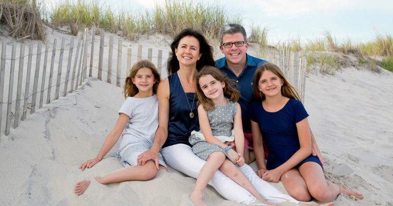 Vicki and David Craver with their daughters at the beach
