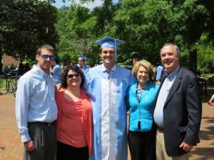 Bob and Molly Joy, far right, celebrate Chris' graduation with brother Robert and sister Kelley.