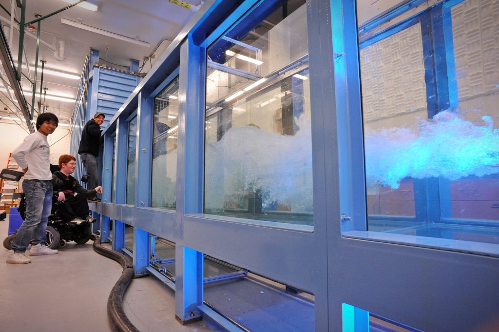 Views of the wave tank in action in Chapman Hall at the University of North Carolina at Chapel Hill.From left are, Sungduk Yu, Jeffrey Olander, and Keith Mertens.
