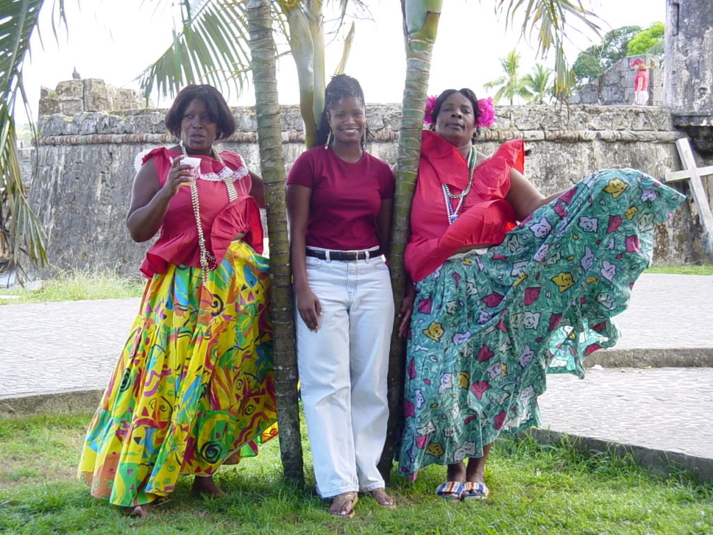Renee Craft, center, poses with Delia Barrera, left, and Atanasia Molinar following a Congo performance.