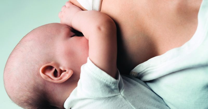 Baby breastfeeds