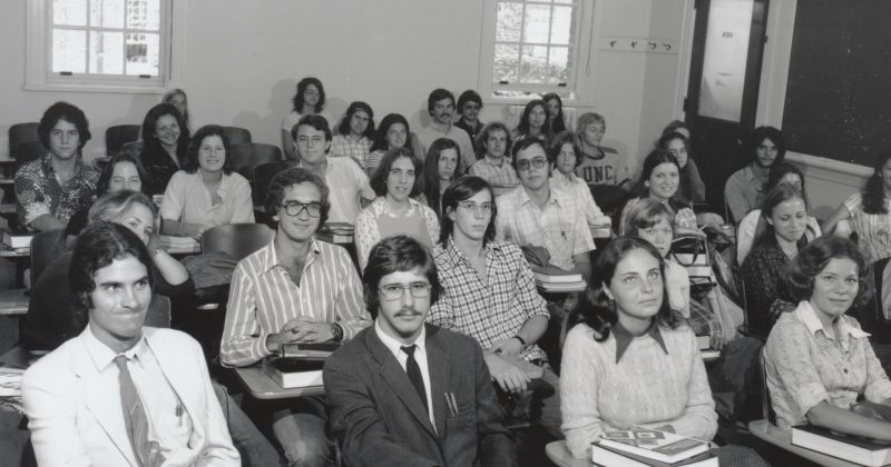 Historical photo showing Father James Devereux’s 1975 English class