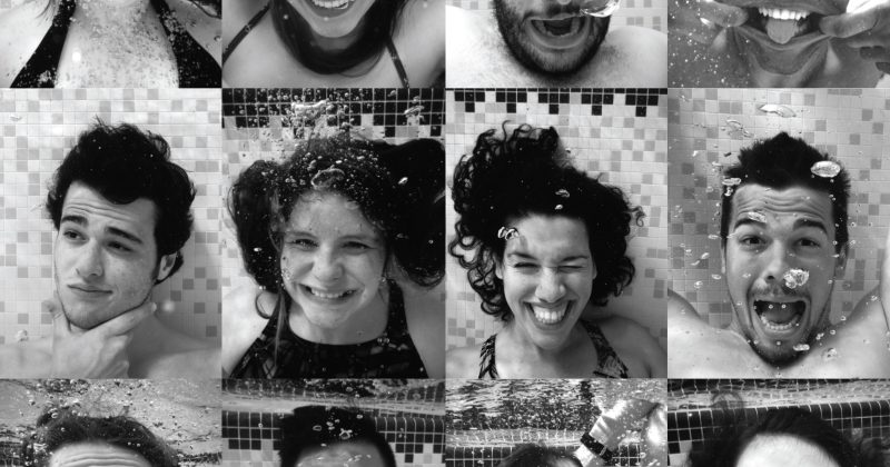 A collage of 12 student portraits, taken underwater and in black and white.