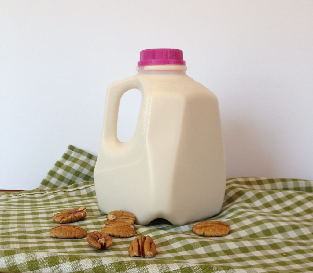 A gallon bottle of pecan milk