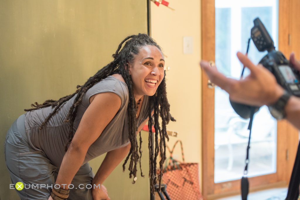 Chérie Ndaliko enjoys a laugh with photographer Steve Exum during the cover shoot.