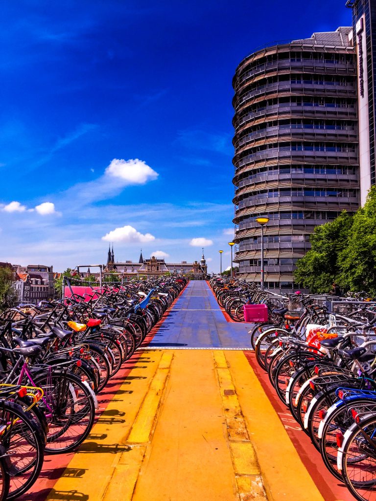 Bikes line a street in Amsterdam