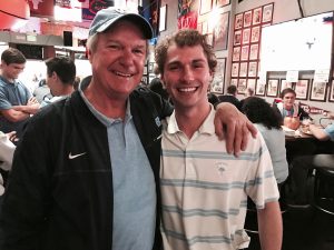 Junior Michael Krantz, right, spends time with UNC alumnus Bill Starling at a UNC basketball watch party in Palo Alto.