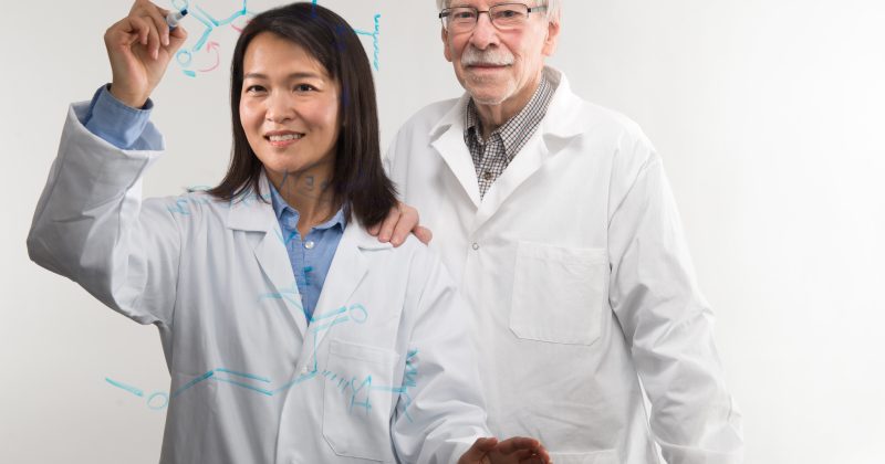Bo Li is one of Carolina chemistry’s rising young stars. Behind her is Royce Murray, who has been with the department for nearly six decades and for whom Murray Hall is named. (phot