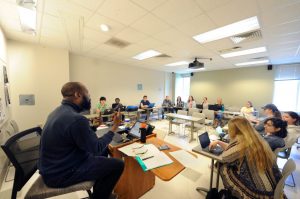 Randall Kenan, shown here teaching one of his creative writing classes, will be inducted into the North Carolina Literary Hall of Fame in October. (photo by Donn Young)