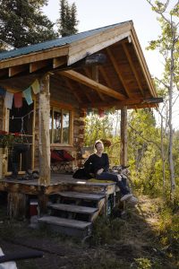 Kate Harris in her cabin in Atlin, British Columbia. (photo by Joanne Ratajczak)