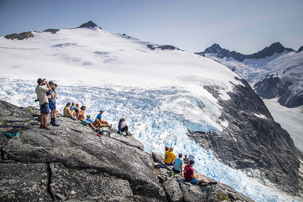 Students receive an outdoor lecture at Camp 18 at the Juneau Icefield