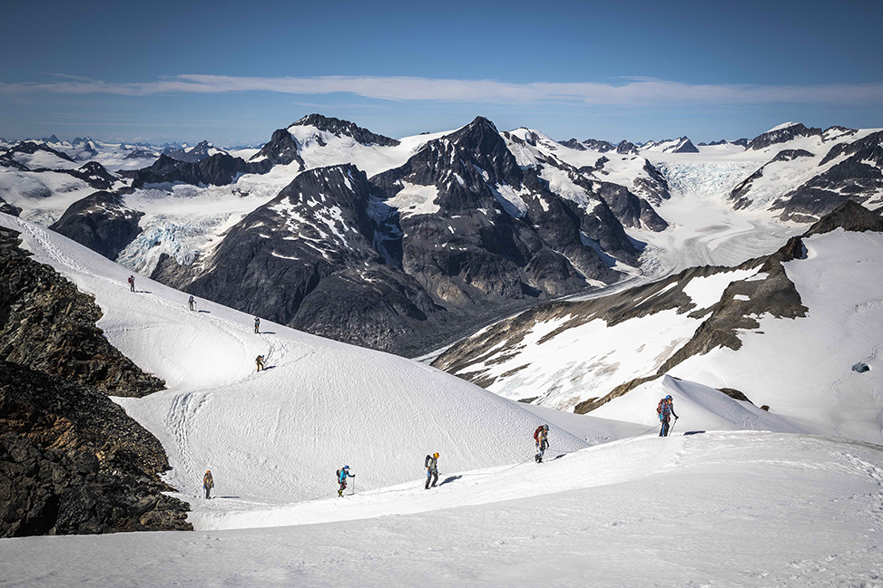 Students hike in a rope team up a peak named 'Sunstorm' on the Juneau Icefield