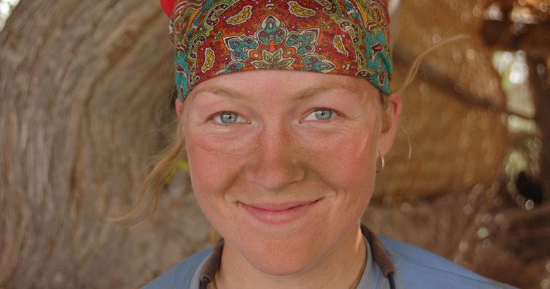 Closeup shot of Kate Harris with a bandana on her head, image from the Silk Road.