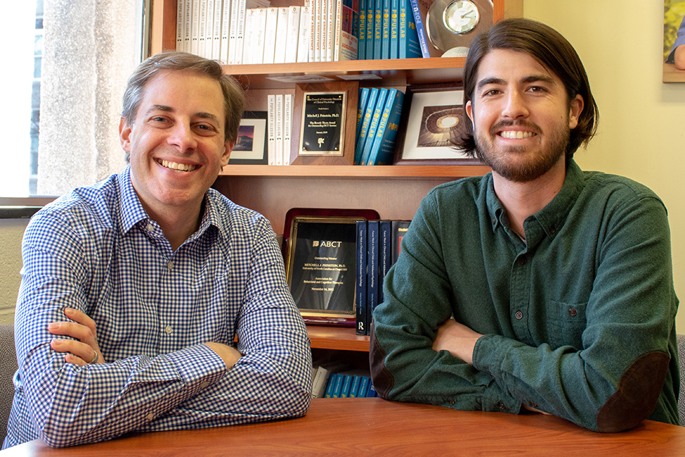 Graduate student Matthew Clayton and his adviser, Mitch Prinstein