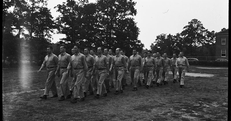 This 1942 photo, taken by famed photographer Hugh Morton, shows U.S. Naval Aviation Pre-Flight School instructors participating in a drill.