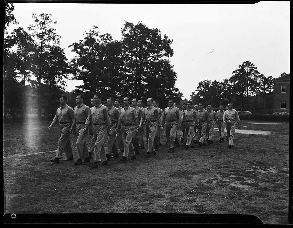 This 1942 photo, taken by famed photographer Hugh Morton, shows U.S. Naval Aviation Pre-Flight School instructors participating in a drill.