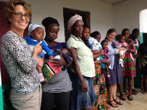 Colloredo-Mansfeld visits with families waiting for treatment appointments at MiracleFeet’s partner clinic in Monrovia, Liberia.