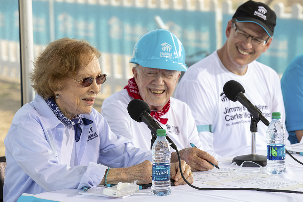 Rosalynn Carter, former President Jimmy Carter and Habitat CEO Jonathan Reckford answer questions during a 2018 Habitat build project in Indiana.