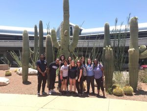 Summer 2019 Cumpston Fellows pause for a photo as they arrive at Tucson International Airport. (photo by Darian Abernathy)