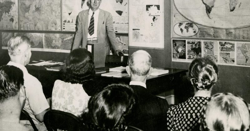 Odum teaches a classroom, circa 1920
