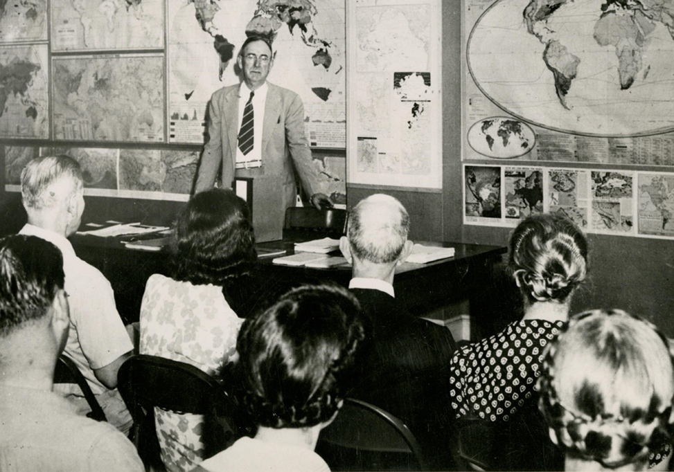 Odum teaches a classroom, circa 1920