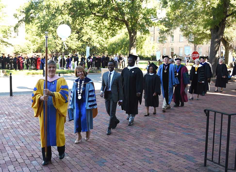 * Rhodes served as the University’s faculty marshal from 2015 to 2019. (photo: UNC-Chapel Hill).