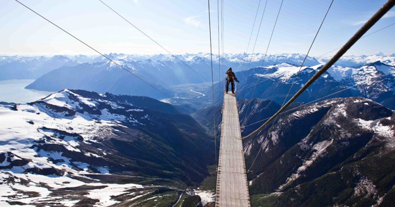 Pablo Durana on a bridge high above Mount Bute in British Columbia