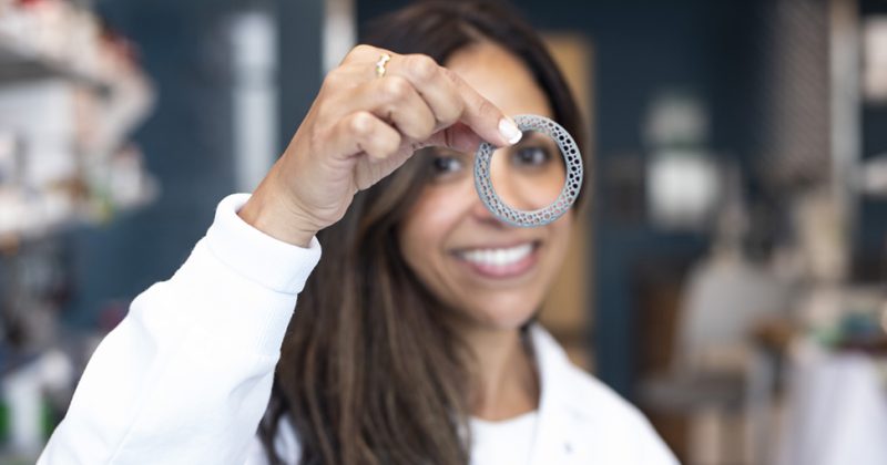 Rahima Benhabbour holds an AnellO PRO, a 3D printed intravaginal ring.