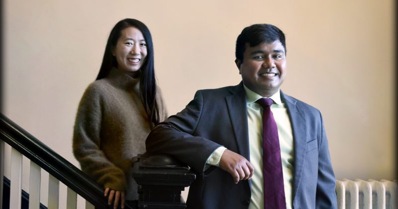 Jiayi Bao and Abhisekh Ghosh Moulick at a staircase in Abernethy Hall.