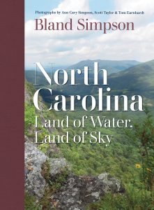 Book cover for Bland Simpson's Land of Water: Land of Sky features a mountain landscape.