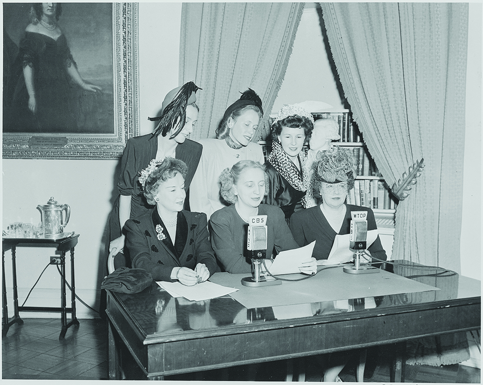 * Margaret Truman (seated, center) in a 1948 White House broadcast. Black and white photo.