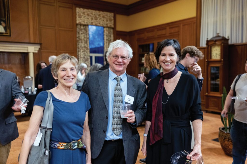 Left to right: Susan Wolf, Lloyd Kramer, and Miranda Fricker at a post-lecture social hour.